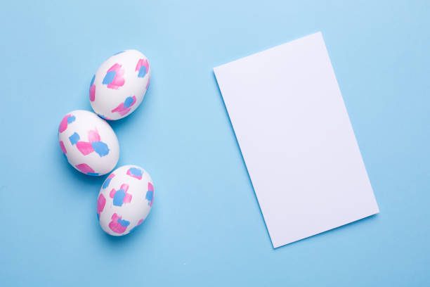 istock Greeting card and easter eggs with watercolor brushstrokes 1132994925