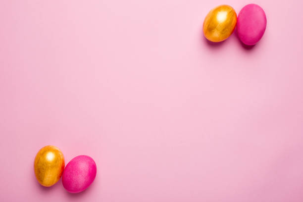 istock Easter pink and gold eggs on a pink background 1132994974