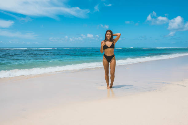 istock Young woman having fun at seaside 1132996881