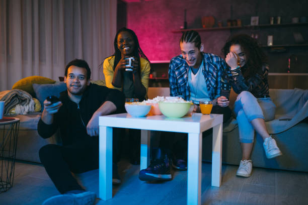 istock Friends watching comedy movie at home 1132997984