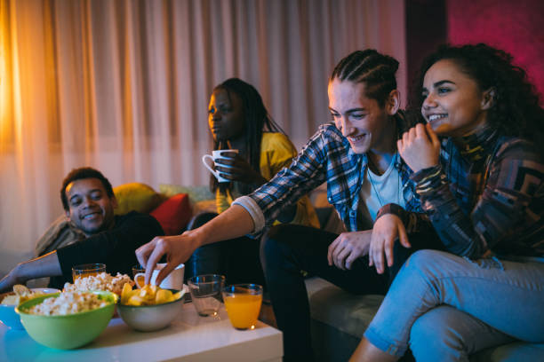 istock Friends spending weekend at home 1132997995