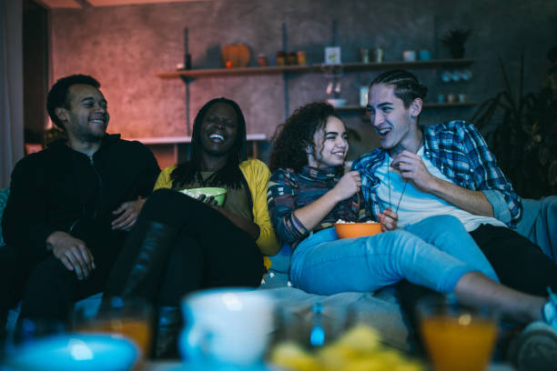 istock Multi-ethnic group of friends spending Friday night at home 1132998350