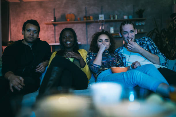 istock Multi-ethnic group of friends spending Friday night at home 1132998397