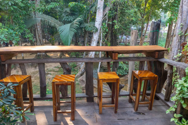 istock table scene and tree in background at coffee cafe 1132999644