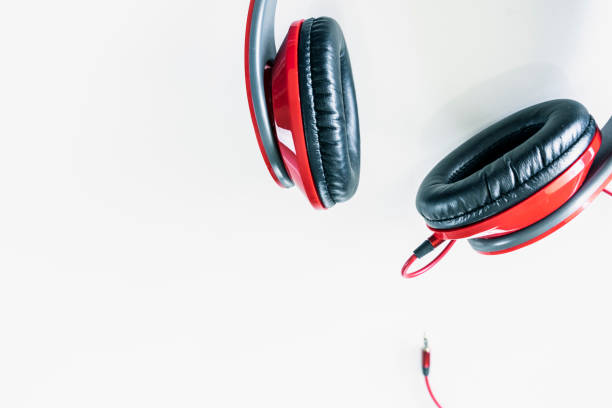 istock red headphones on white background with a jack 1132999790