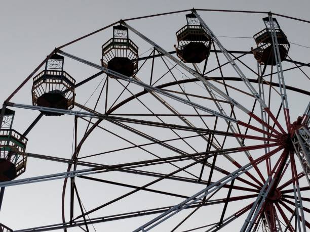 istock Amusement park with giant Ferris wheel 1133000519