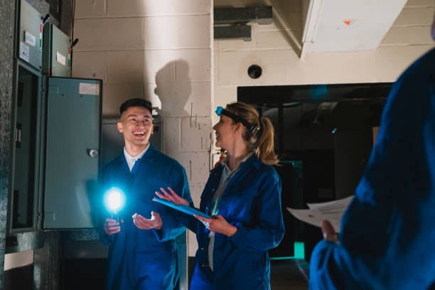 istock Trainee Electricians in the Basement 1133003128