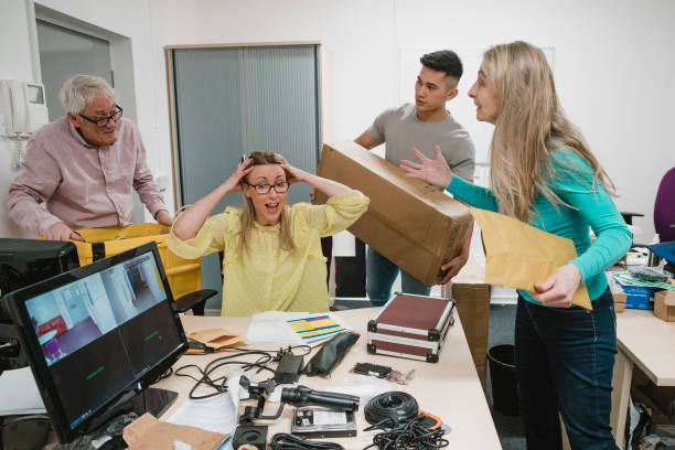 stressful day at the office - rudeness manager emotional stress asian ethnicity imagens e fotografias de stock