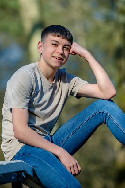 istock Teenage boy outside on a bright Spring day 1133007102
