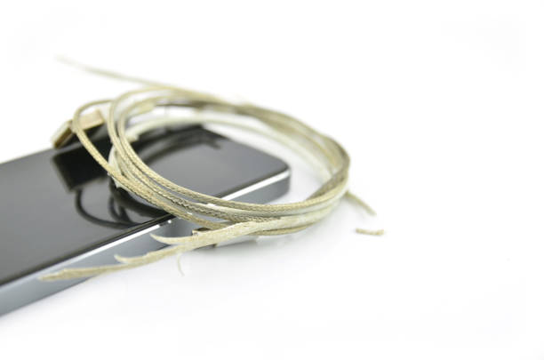 istock Close Up the Broken SmartPhone Charger Cable isolated on white Background. 1133009137