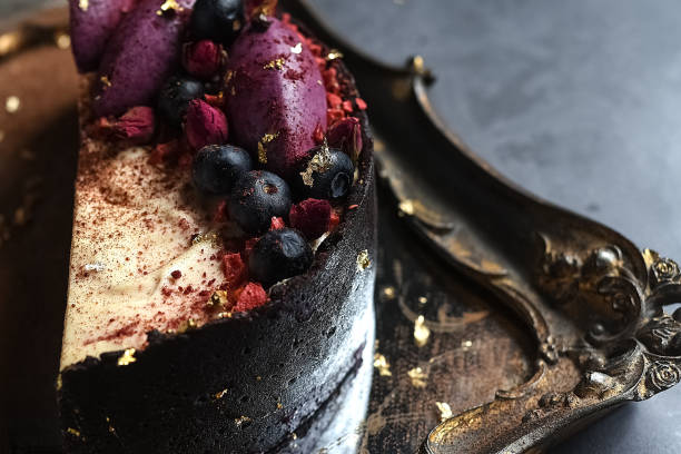 istock Homemade chocolate frosted cake decorated with fresh fruit 1133015270