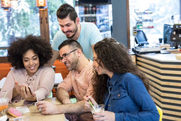 istock Young people enjoying time together in cafe 1133015882