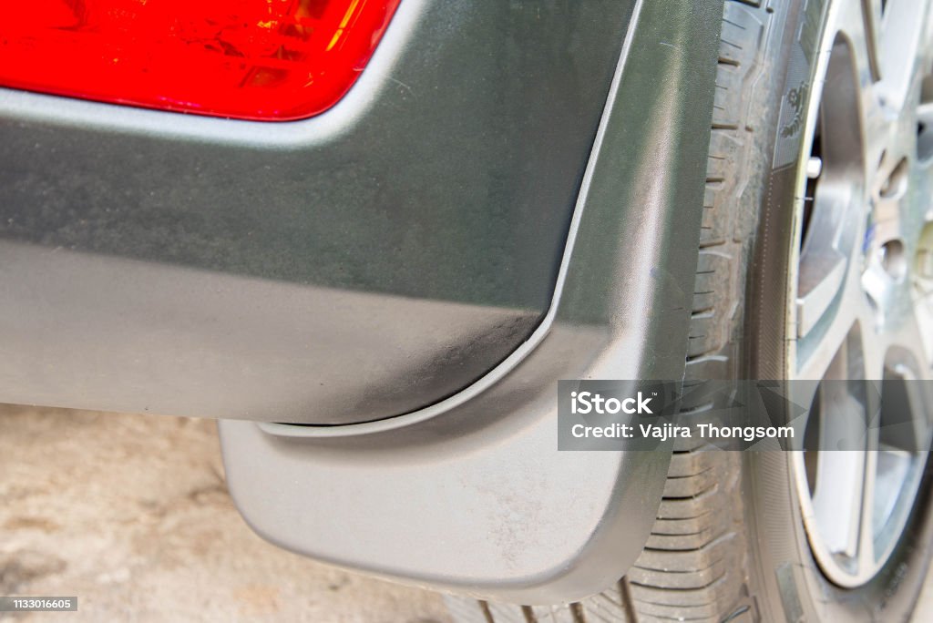 Car Mudgaurd Mudflap On Rear Wheels Stock Photo - Download Image Now -  Mudguard, Car, Rubber - Material - iStock