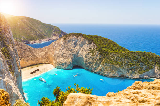 istock Sunny bay with turquoise sea 1133017317