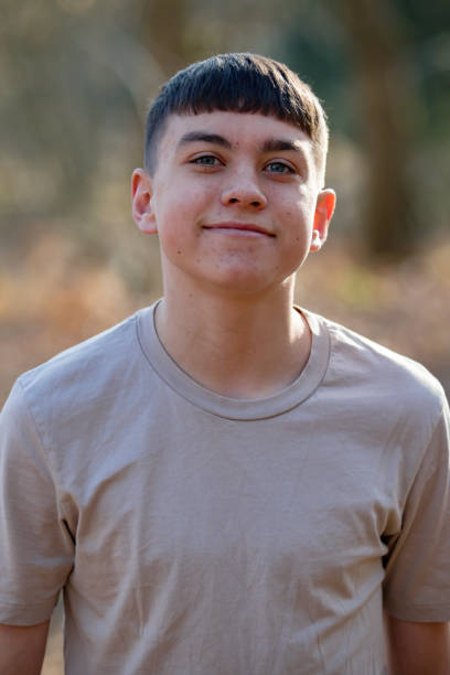 istock Teenage boy outside on a bright Spring day 1133019768
