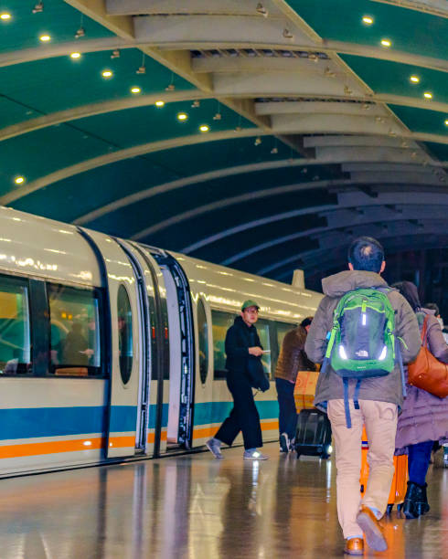 people at maglev train station, shanghai, china - transrapid international imagens e fotografias de stock