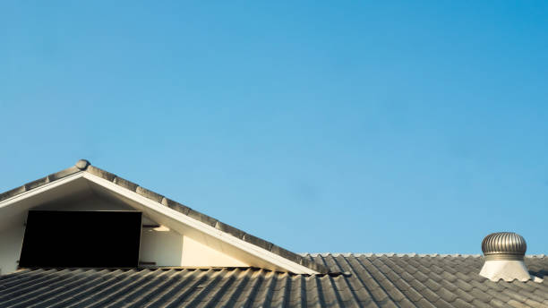 istock roof and blue sky 1133024900