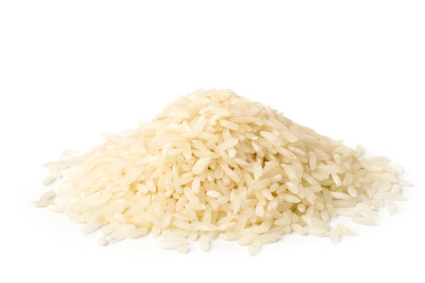 istock A pile of rice on a white background. 1133028884