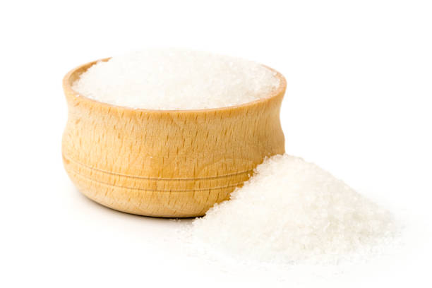 istock Sugar in wooden plate and scattered, isolated. 1133028936