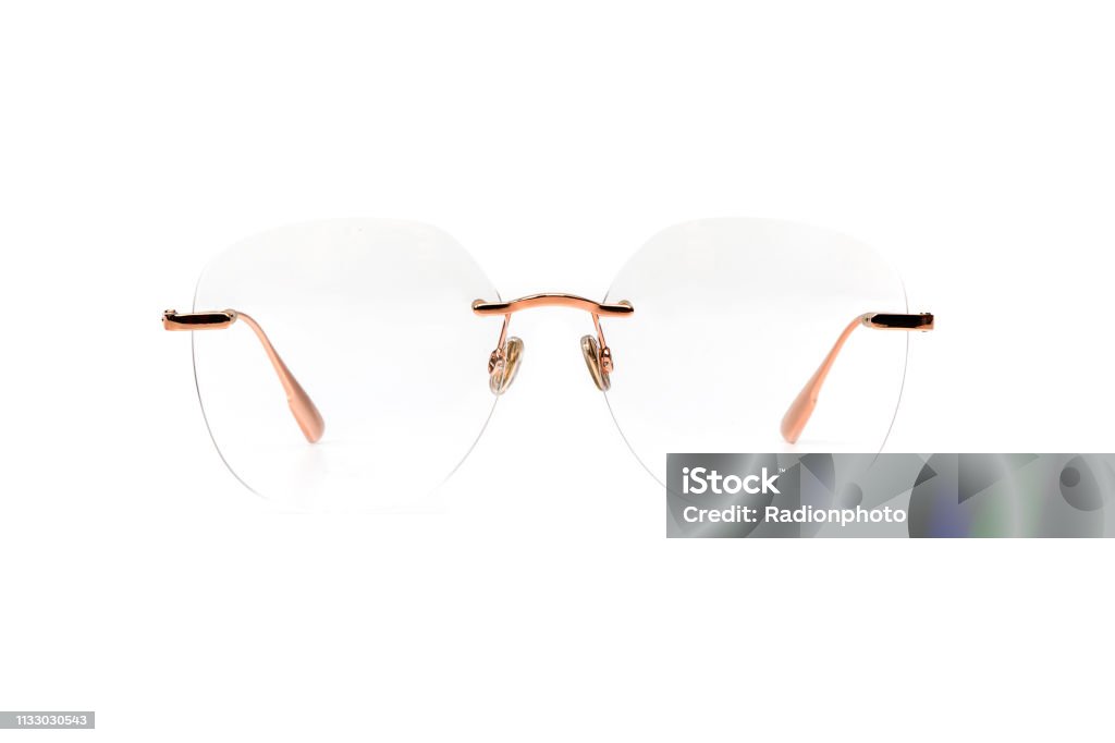 Gold transparent glasses metal isolated on white background Gold transparent glasses metal isolated on white background. Cut Out Stock Photo