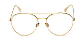 Gold glasses metal in round frame transparent for reading or good eye sight, front view isolated on white background