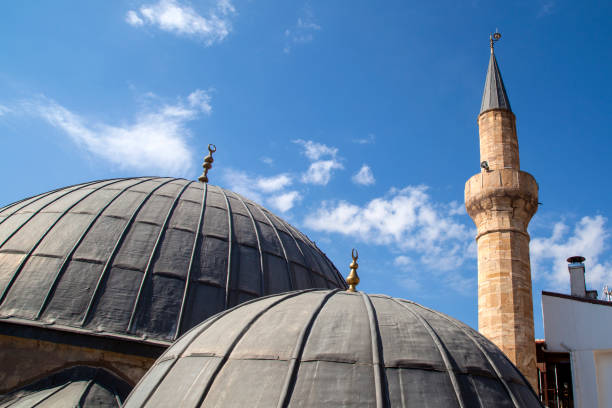 istock an old mosque domes and minaret 1133031439