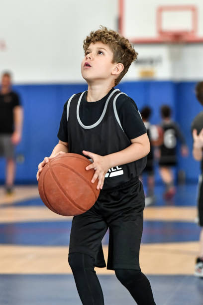 istock Little boy playing basketball 1133033253