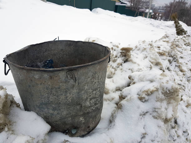 istock beautiful vintage garbage can on snow 1133034255