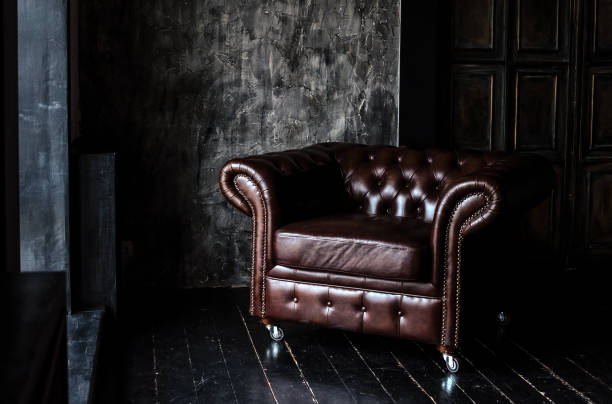 istock Sofa of brown leather standing in center 1133035769
