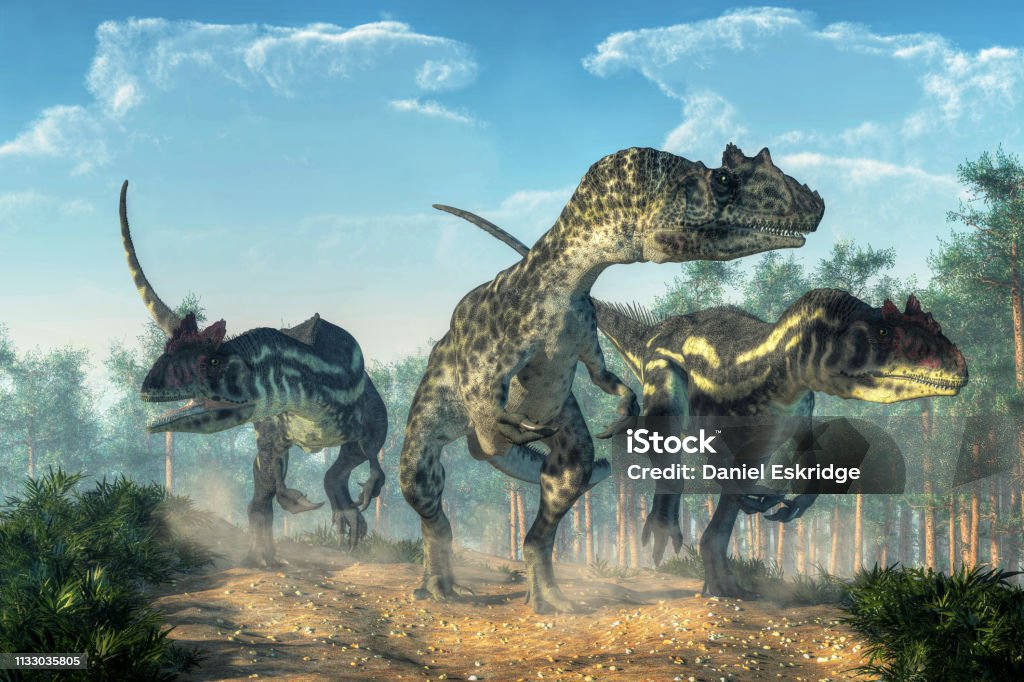 Three Allosauruses Three allosauruses kick up dust as they hunt along a rocky track created by the passage of large dinosaurs.  Three hunters on the prowl. 3D Rendering Allosaurus Stock Photo