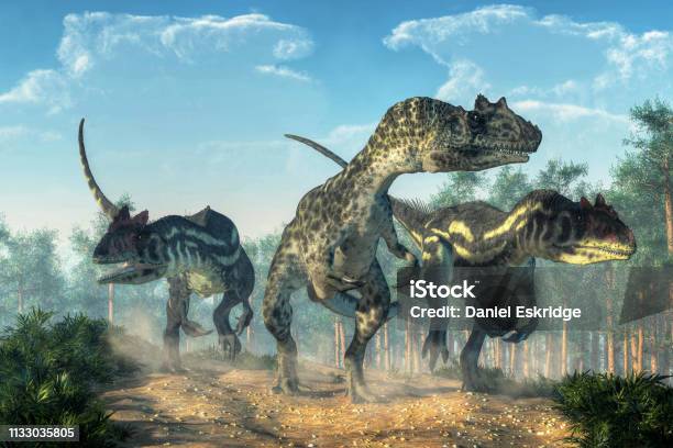 Three Allosauruses Stock Photo - Download Image Now - Allosaurus, Dinosaur, Hunting - Sport