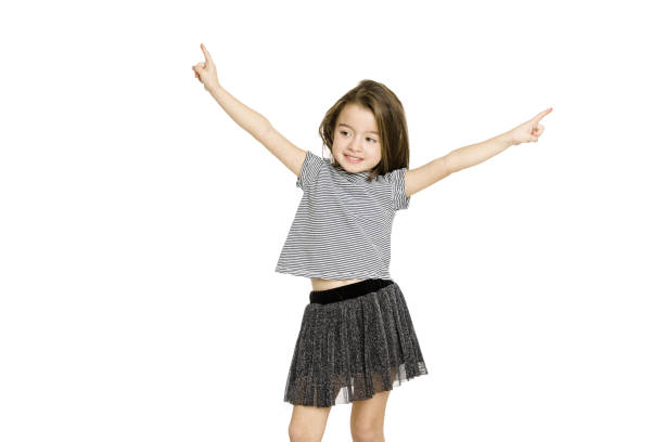 istock Young girl looking at camera with happy facial expression 1133035880