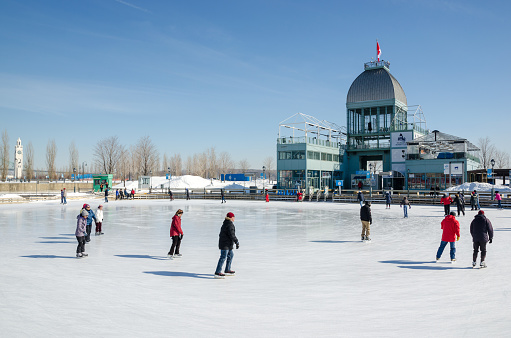 Montreal, Canada - 5th March 2016: People skating at Old Port Ice Skating Rink