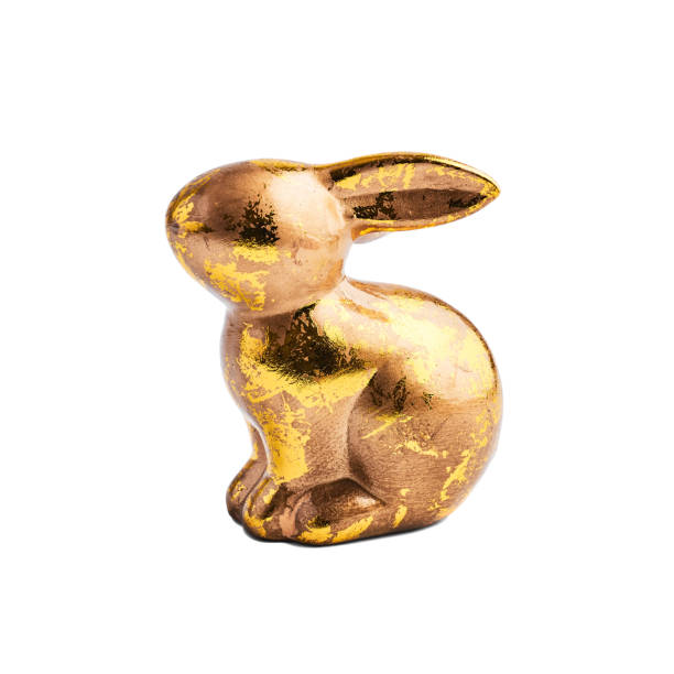 istock Golden rabbit figure isolated on white background 1133037581