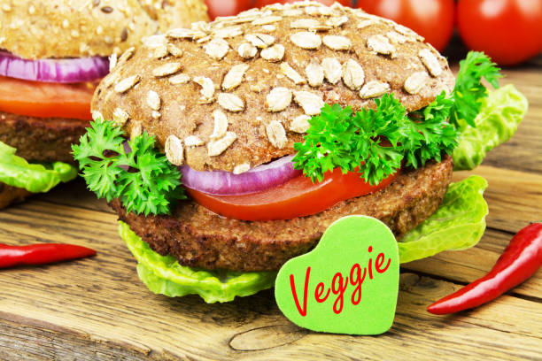 Veggie Burger snack with soy Hamburger vegetarian food and salad close up meat substitute stock pictures, royalty-free photos & images