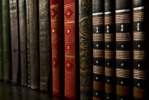 istock Old books on a bookshelf as abstract background. Vintage books 1133043666