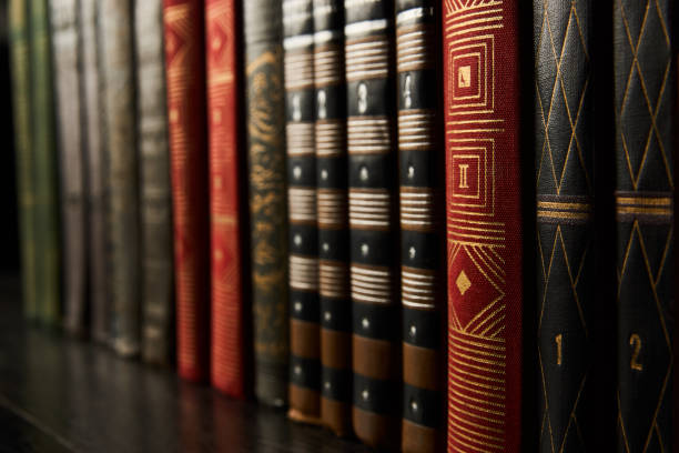 istock Old books on a bookshelf as abstract background. Vintage books 1133043672