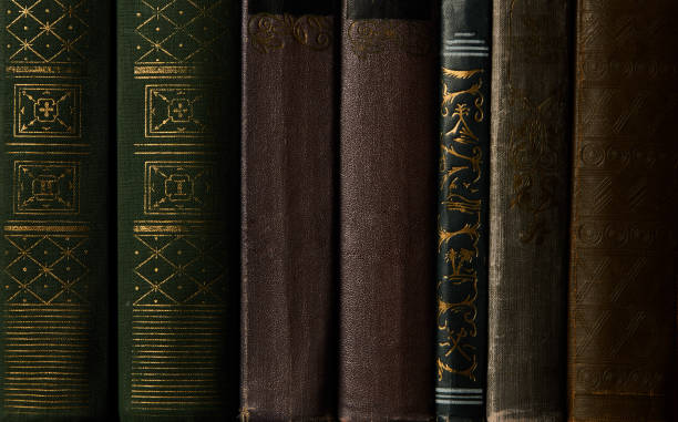 istock Old books on a bookshelf as abstract background. Vintage books 1133043673