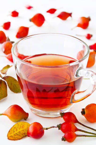istock Rose hip tea and glass cup with fruits 1133043796