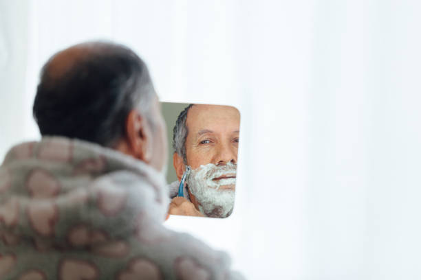 istock Senior men beauty treatment in front of mirror 1133044432