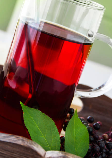 istock Elderberry tea and  in a glass cup 1133044730
