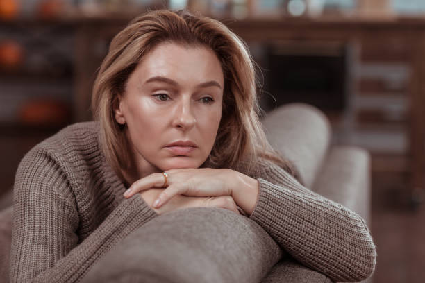 istock Appealing businesswoman feeling thoughtful and very concerned 1133047624