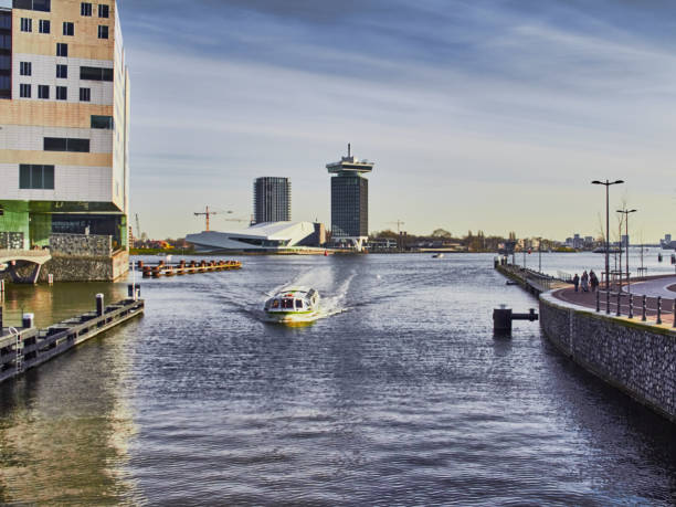 istock Amsterdam city scape in January with canals 1133047702
