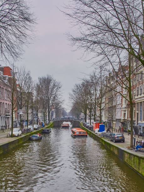istock Amsterdam city scape in January with canals 1133053419