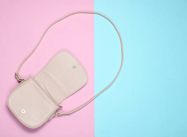 istock Stylish leather bag on a pastel background. Top view, minimalism 1133055755