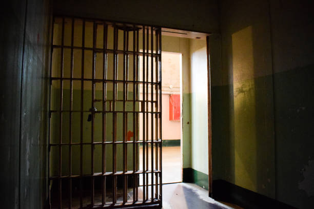 Inside Alcatraz Isolation Cell, D-Block Photo taken from inside one of the Alcatraz Prison cells (Isolation, D-Block). prison escape stock pictures, royalty-free photos & images