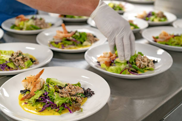 istock Chef making gourmet Hawaiian salad with shrimp and crab 1133064632