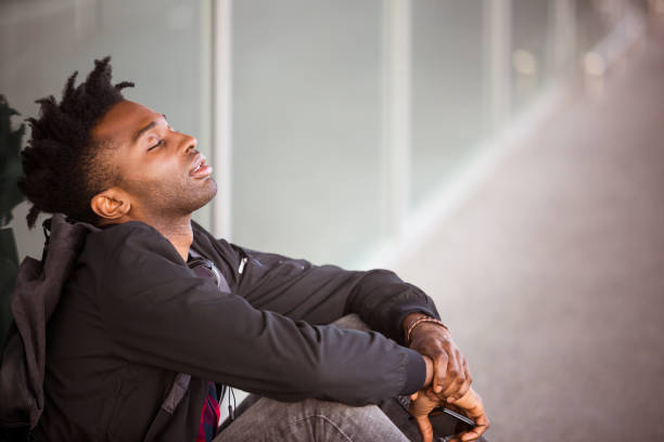 istock Bored man sitting at airport 1133067081