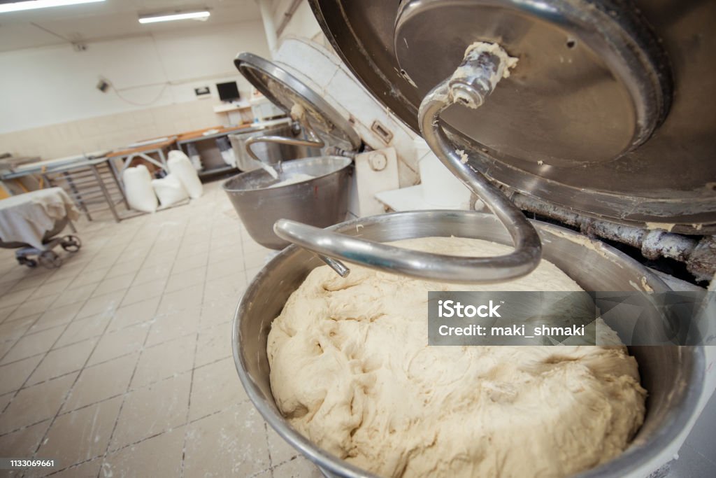https://media.istockphoto.com/id/1133069661/photo/making-dough-for-bread-in-a-kneader-in-a-bakery.jpg?s=1024x1024&w=is&k=20&c=xAYUJF8X8Vpr7TLQSF5f_NebwA0coeKLSLm41I3HRsM=