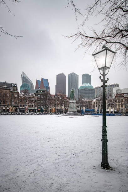 istock Snow on the central place, Spui in Dutch, usually crowded with people getting diner and drink during the sunset and warm autumn weather in The Hague, Netherlands 1133070746